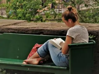 Student reading and listening